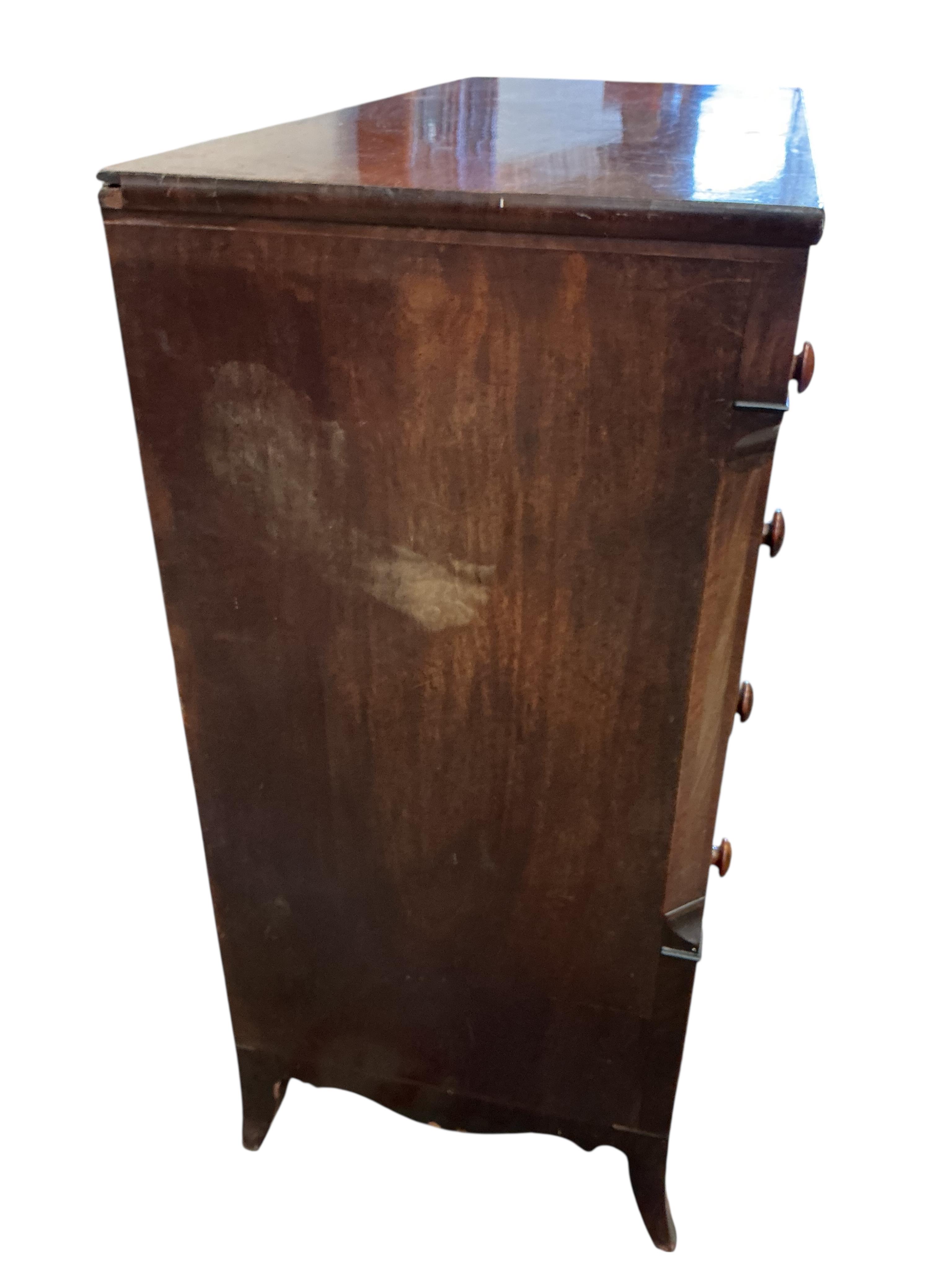 A George IV mahogany chest of drawers with bone escutcheons, width 122cm, depth 56cm, height 121cm